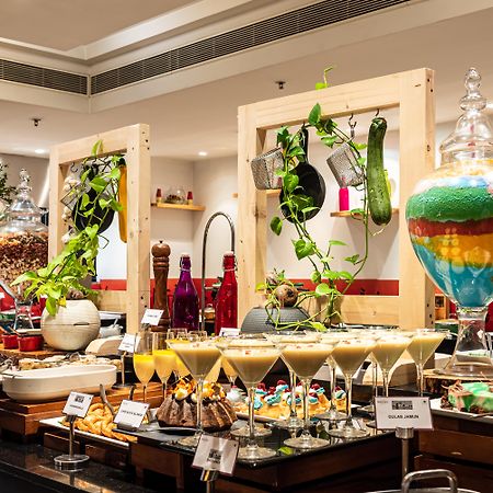 Mercure Hyderabad Kcp Banjara Hills, An Accor Hotel Exterior foto A dessert buffet at a hotel in India