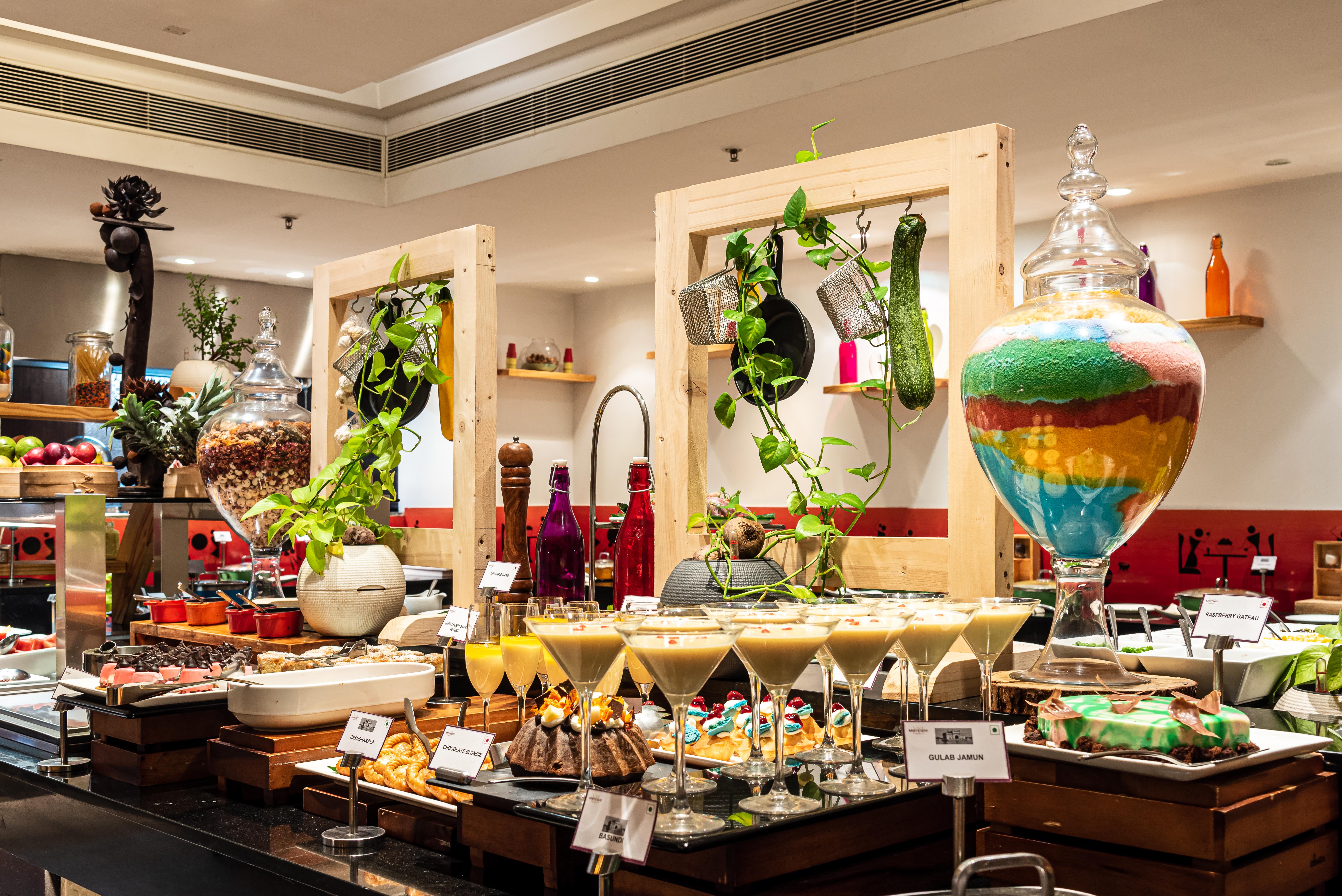 Mercure Hyderabad Kcp Banjara Hills, An Accor Hotel Exterior foto A dessert buffet at a hotel in India
